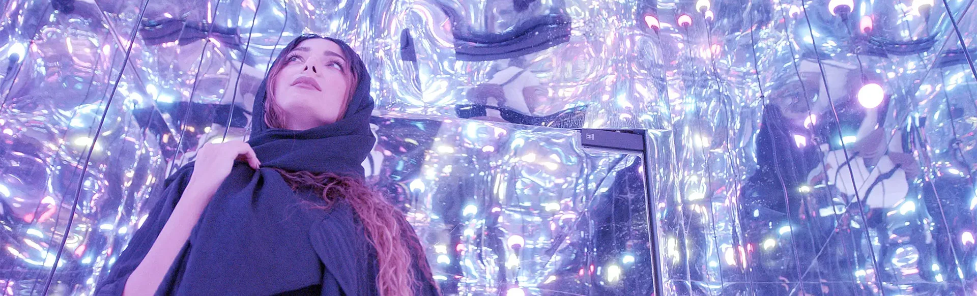 Vodafone immersive exhibition room at COMEX 2022 featuring LED cube and mirror installation by Ortmor Agency